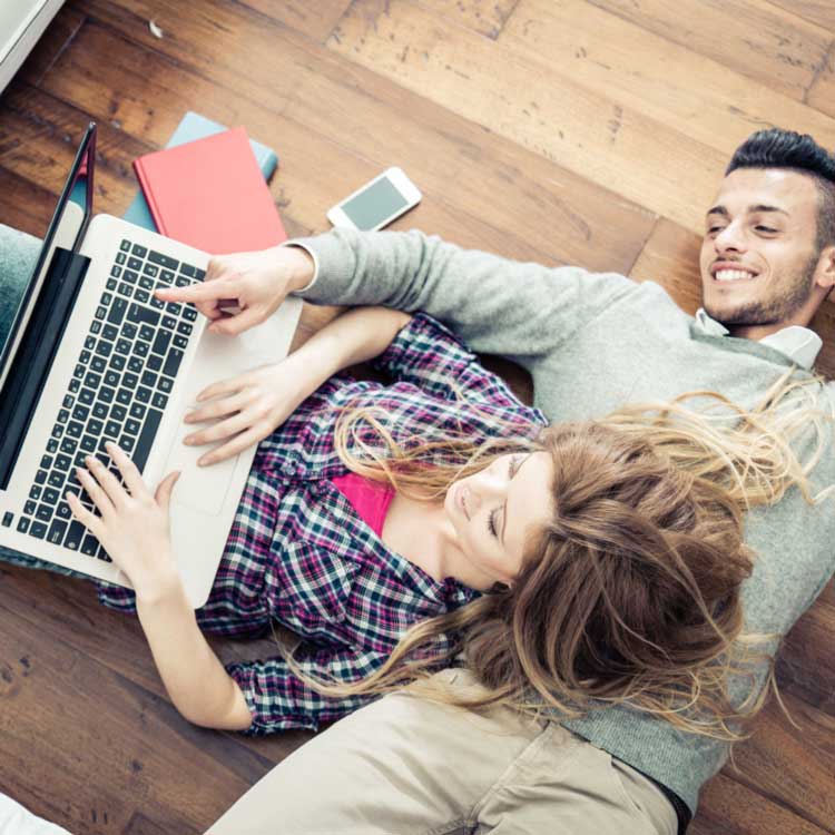 Young couple shopping for car online